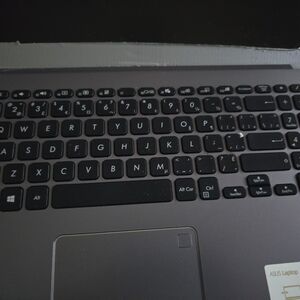 Not workingASUS Black Laptop